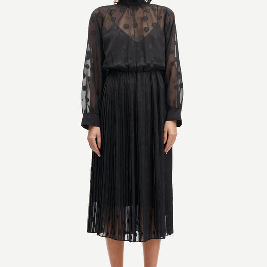 High neck chiffon midi dress with long sheer sleeves and applique dots with pleated skirt