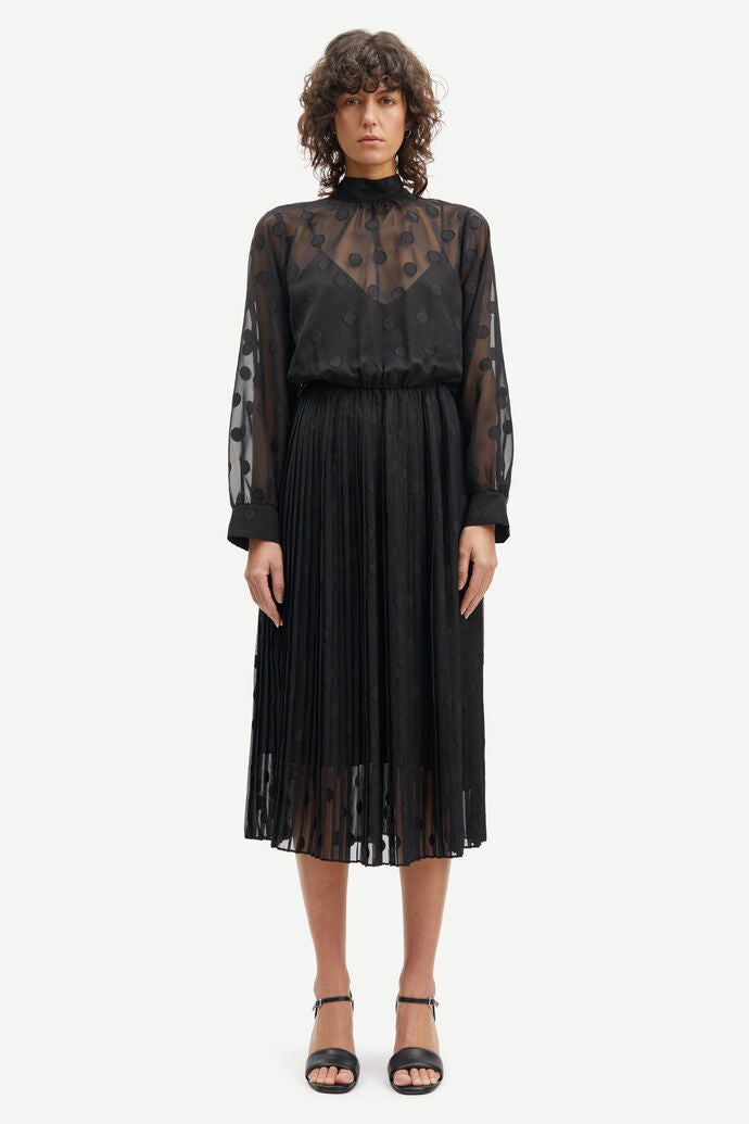 High neck chiffon midi dress with long sheer sleeves and applique dots with pleated skirt