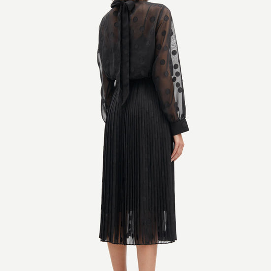 High neck chiffon midi dress with long sheer sleeves and applique dots with pleated skirt