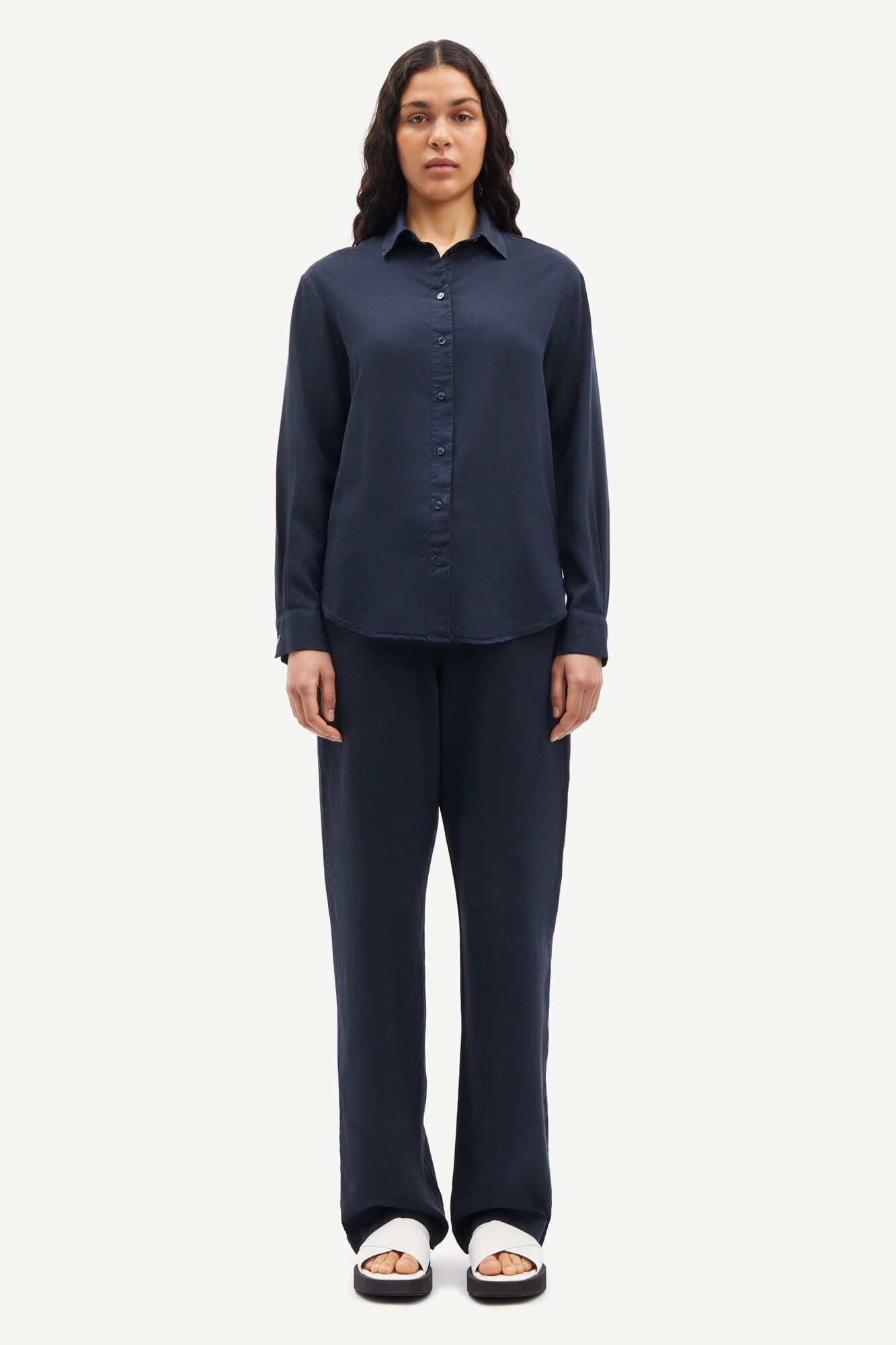 Straight leg navy trousers with elasticated waistband and drawstring