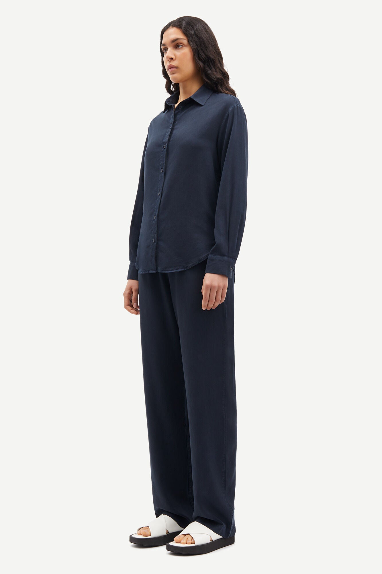 Straight leg navy trousers with elasticated waistband and drawstring