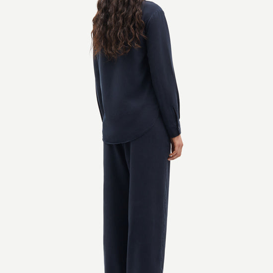 Straight leg navy trousers with elasticated waistband and drawstring