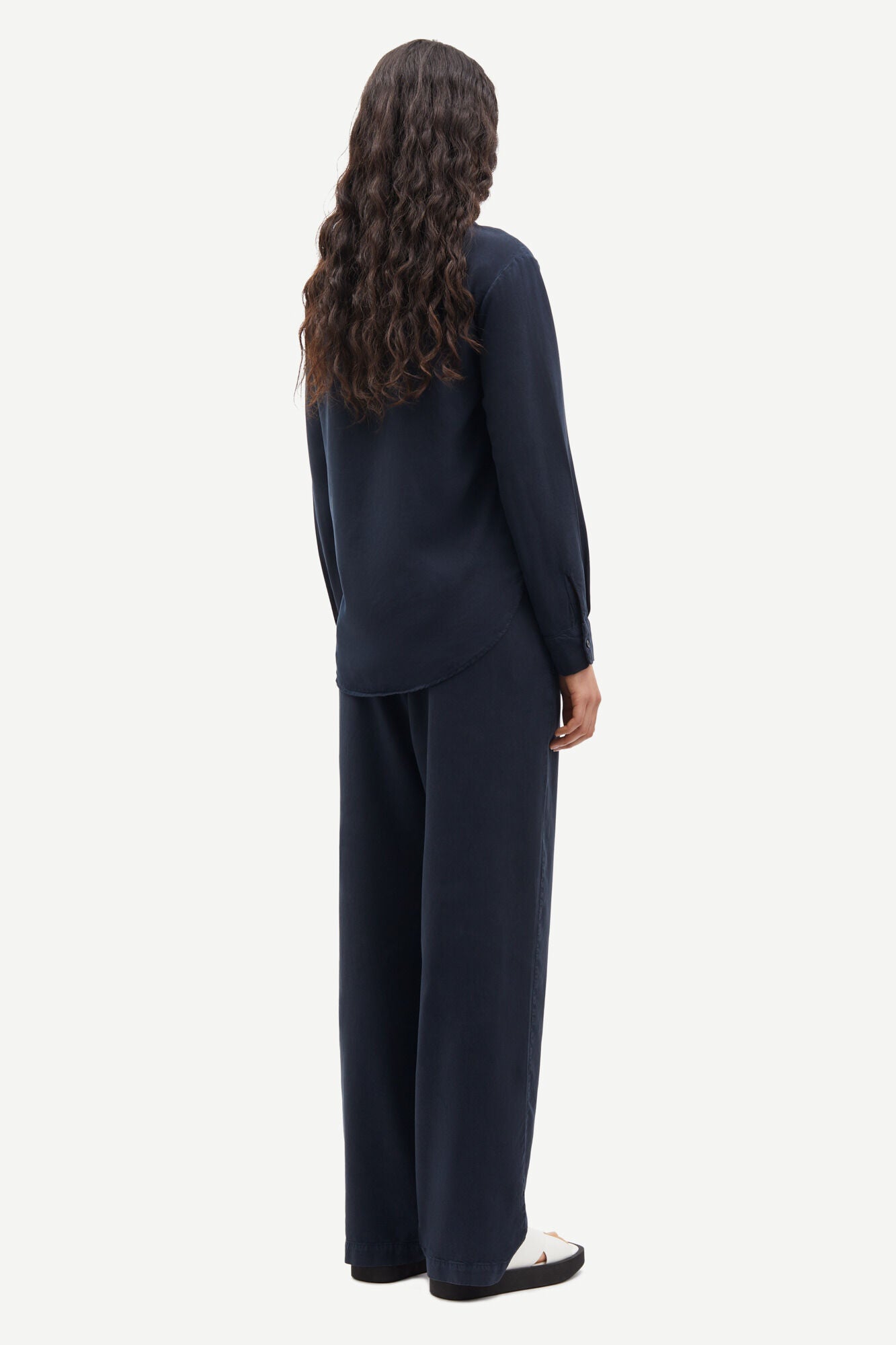 Straight leg navy trousers with elasticated waistband and drawstring