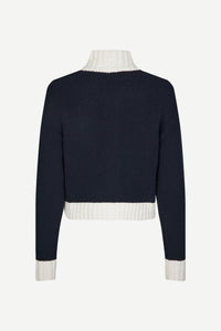 Navy chunky cardigan with ecru contrast ribbed neckline cuffs and hem with two-way zip closure