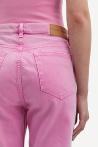 pink button fly jeans with a straight leg