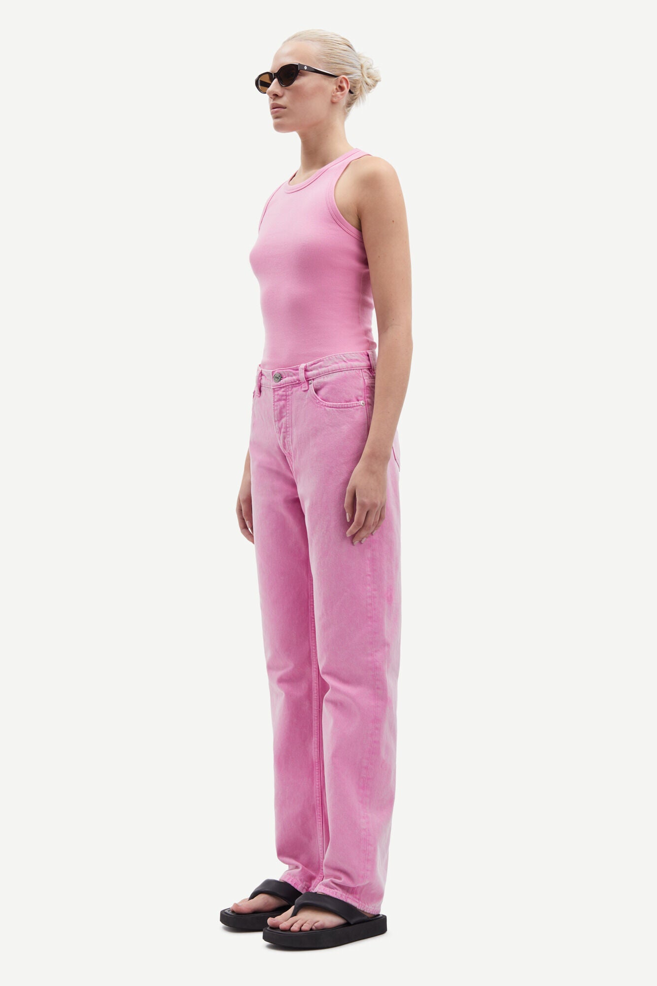 pink button fly jeans with a straight leg