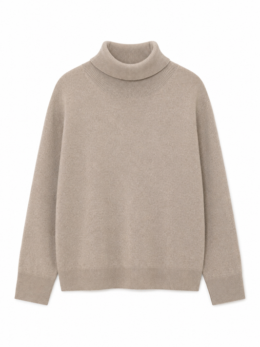 A light beige knit turtleneck sweater with long sleeves and ribbed cuffs and hem, shown against a plain white background.