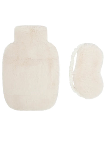 White knitted hot water bottle and cover on a white background