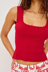 Red tank top worn by a person on a white background from Rails