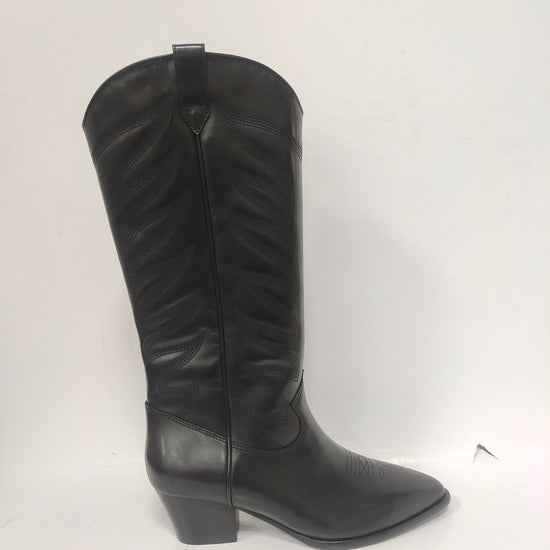 Tall black cowboy boots with quilted details on the shaft