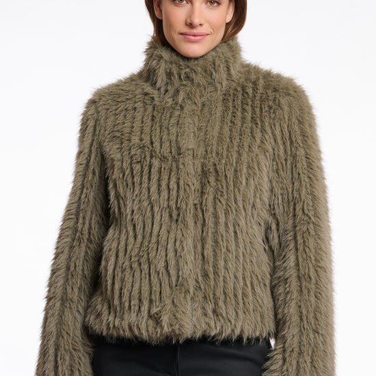 green faux fur jacket with central closure, high neck and stripe detailing in the fur
