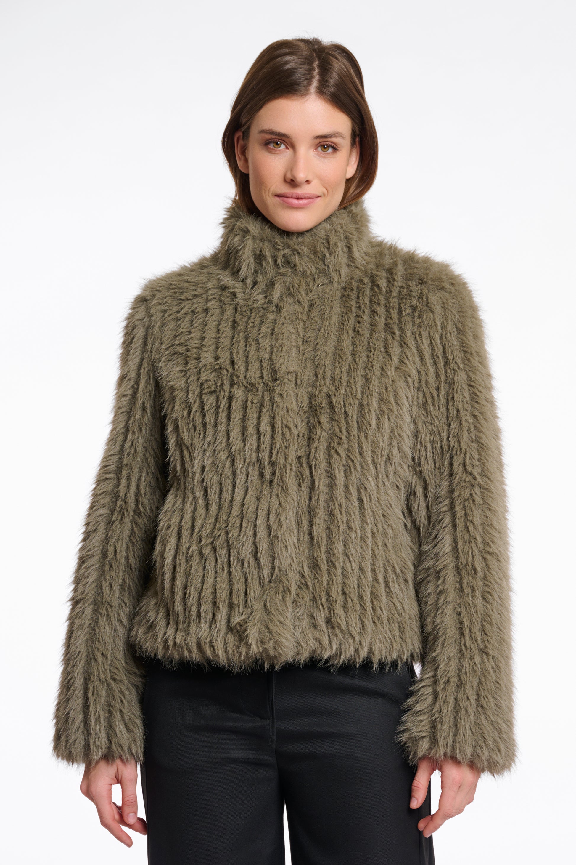 green faux fur jacket with central closure, high neck and stripe detailing in the fur