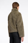 green faux fur jacket with central closure, high neck and stripe detailing in the fur rear view 
