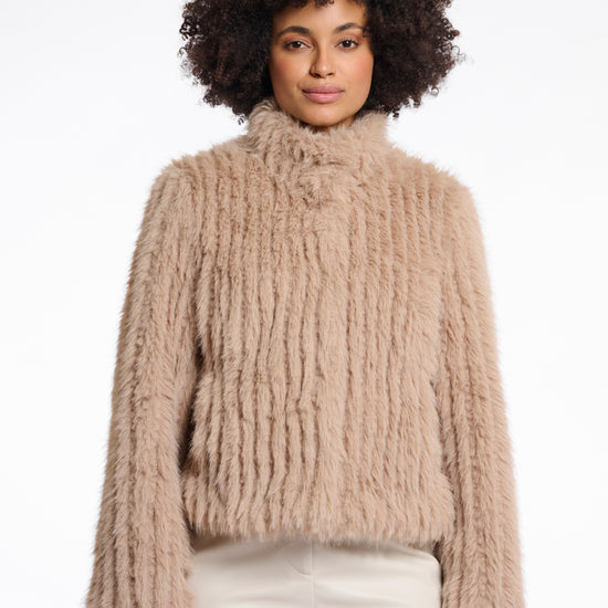 light beige faux fur jacket with high neck, central closure and stripe detailing in the fur
