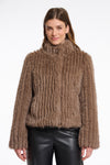 brown faux fur jacket with high neck, central closure and stripe detailing in the fur