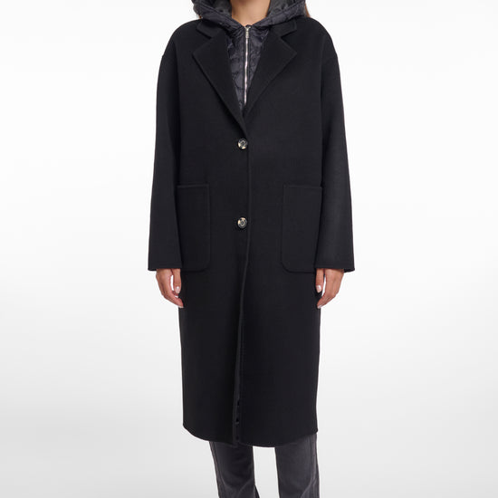 single breasted black coat with interior quilted gilet and 2 patch pockets 