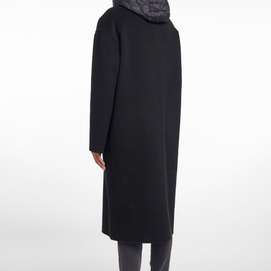 single breasted black coat with interior quilted gilet and 2 patch pockets  rear view