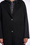 single breasted black coat with interior quilted gilet and 2 patch pockets close up