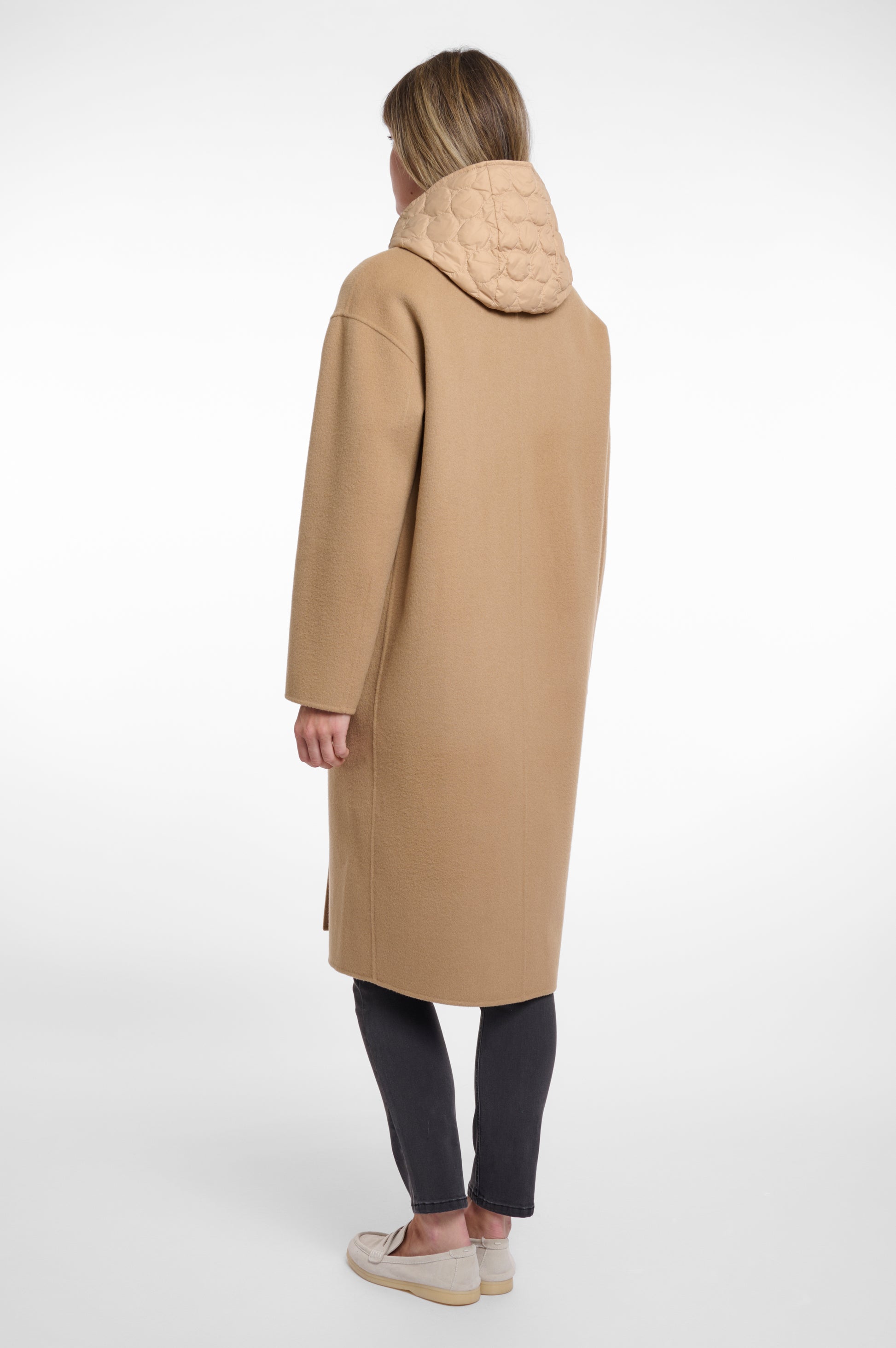 single breasted camel coat with interior quilted gilet and 2 patch pockets  rear view