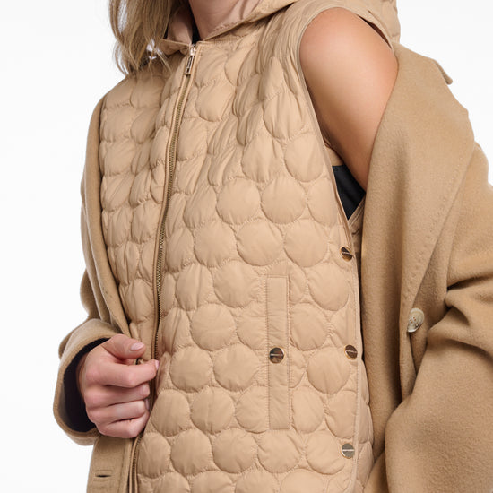 single breasted camel coat with interior quilted gilet and 2 patch pockets  photo of inside gilet