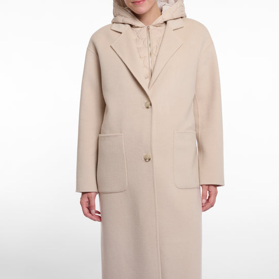 single breasted light beige coat with interior quilted gilet and 2 patch pockets model shot