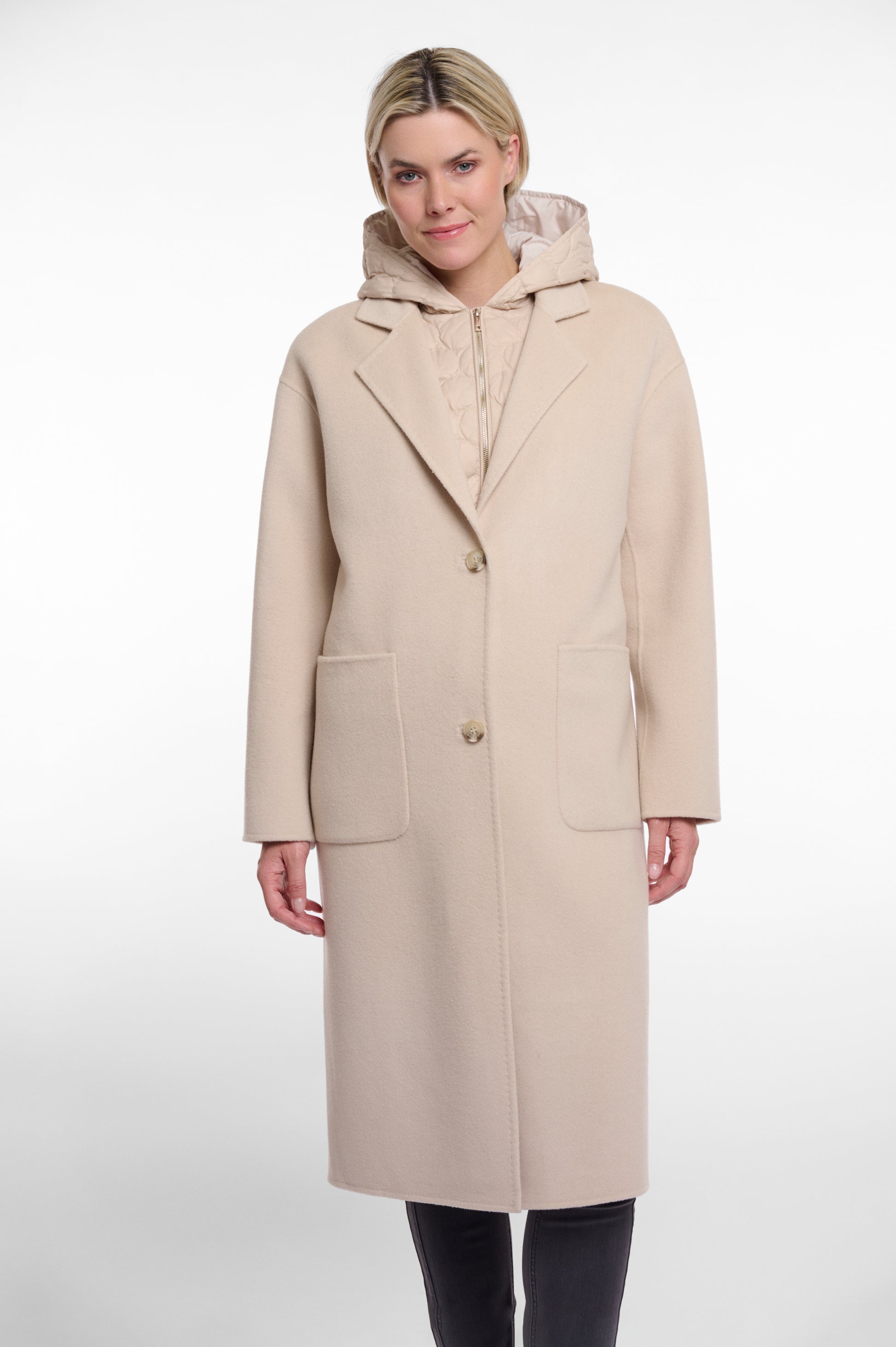 single breasted light beige coat with interior quilted gilet and 2 patch pockets model shot