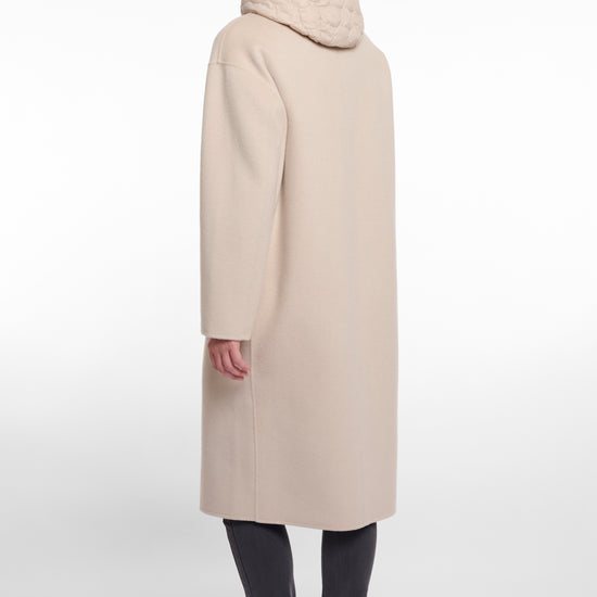 single breasted light beige coat with interior quilted gilet and 2 patch pockets  rear view