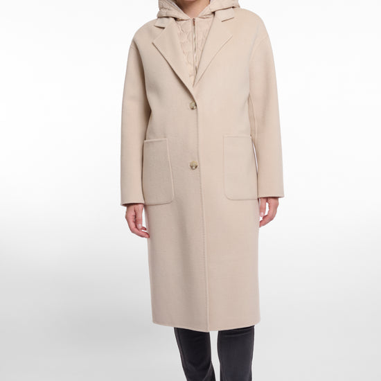single breasted light beige coat with interior quilted gilet and 2 patch pockets 