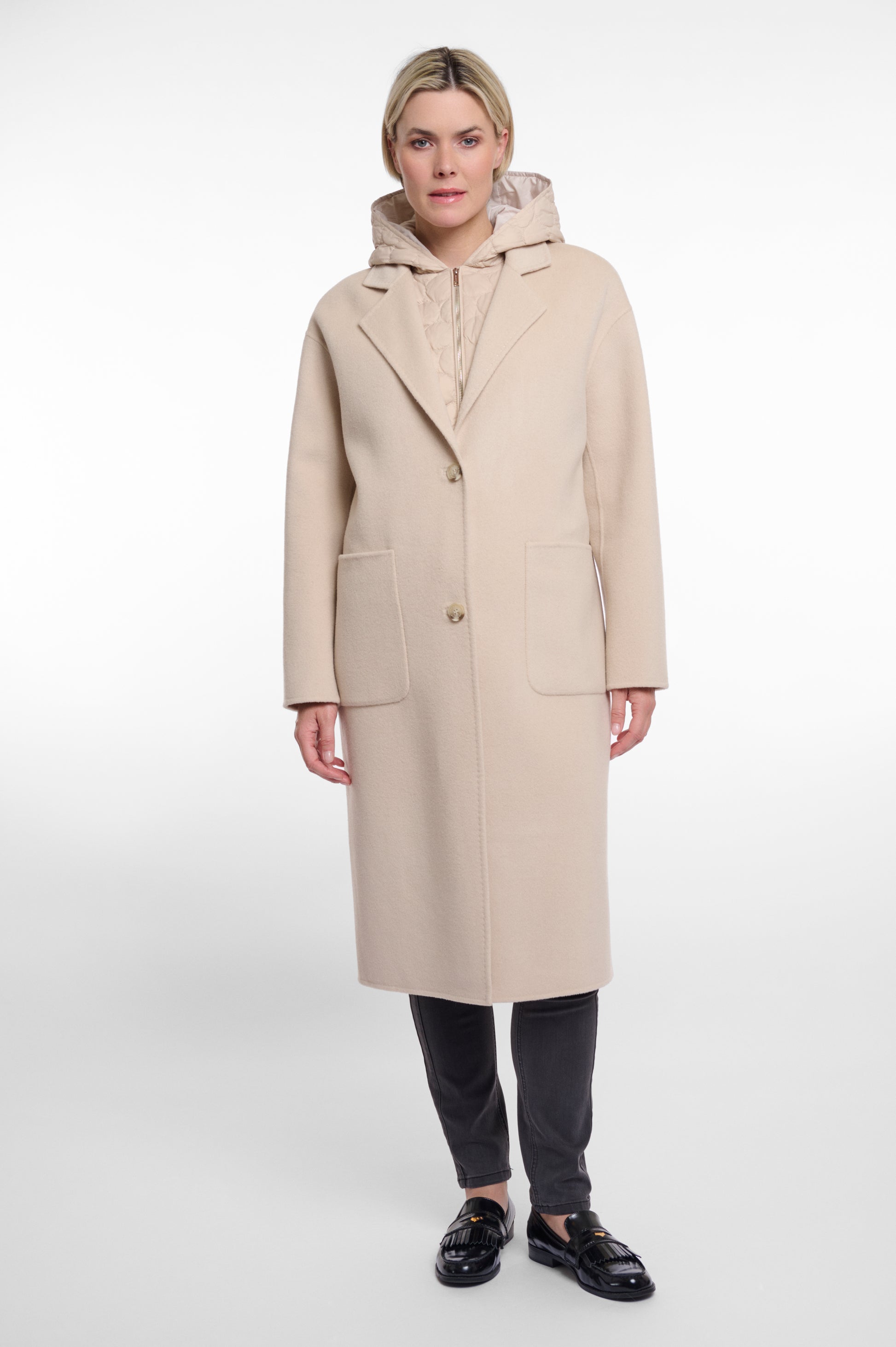 single breasted light beige coat with interior quilted gilet and 2 patch pockets 