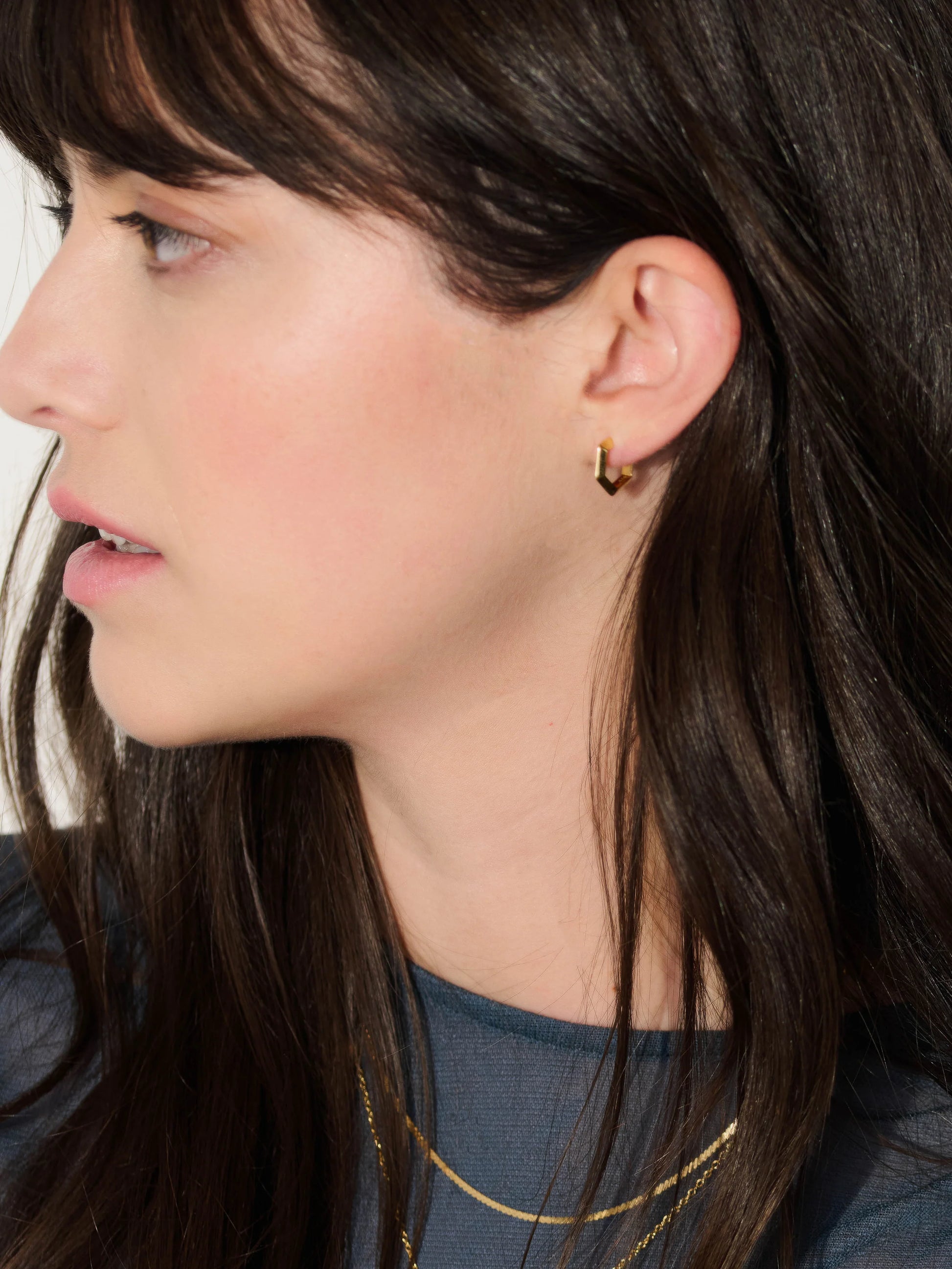 mini hexagon silver shaped hoops from rachel jackson model shot