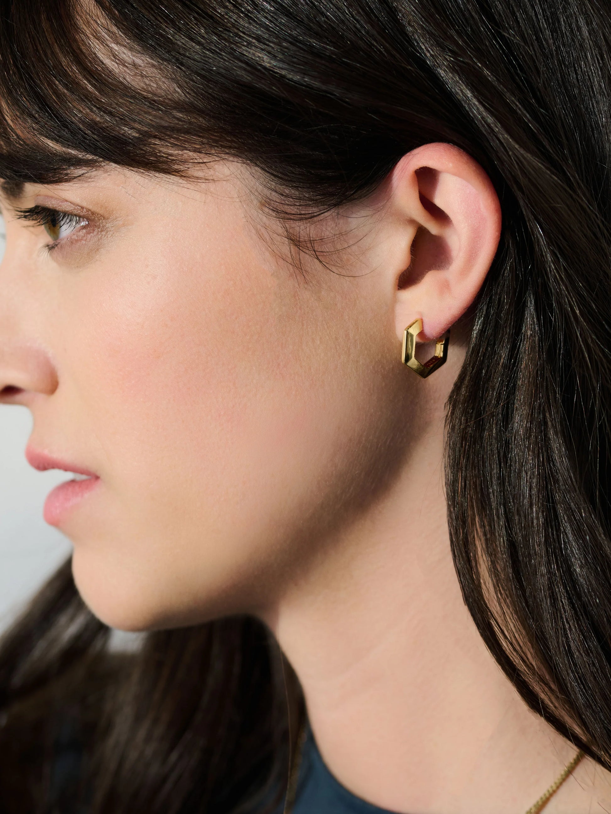 mini hexagon silver shaped hoops from rachel jackson model shot