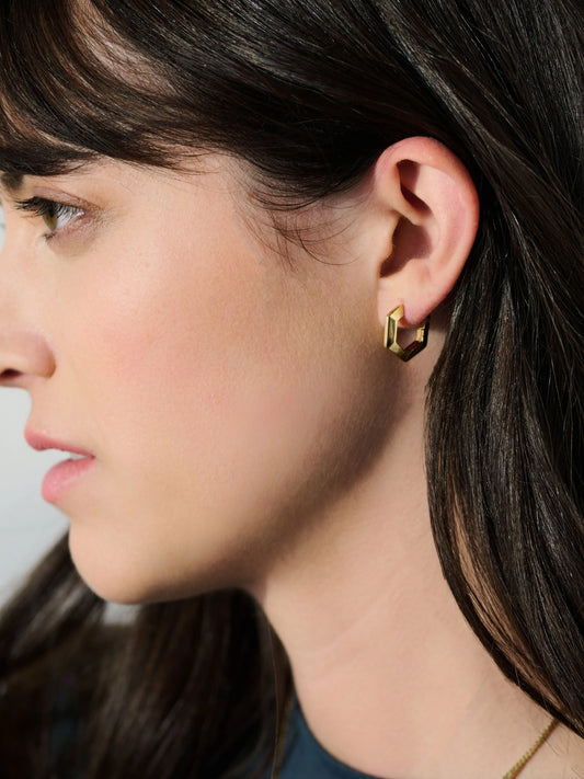 mini hexagon silver shaped hoops from rachel jackson model shot