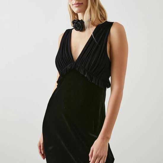 Black V neck dress with gathered strapless viscose and silk blend gathered top with ruffle empire line detailing and a straight velvet midi skirt