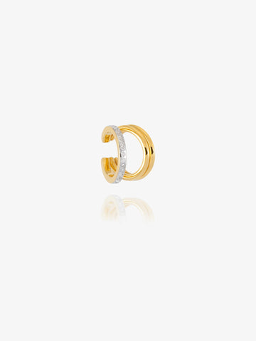 gold and silver ear cuff on white background