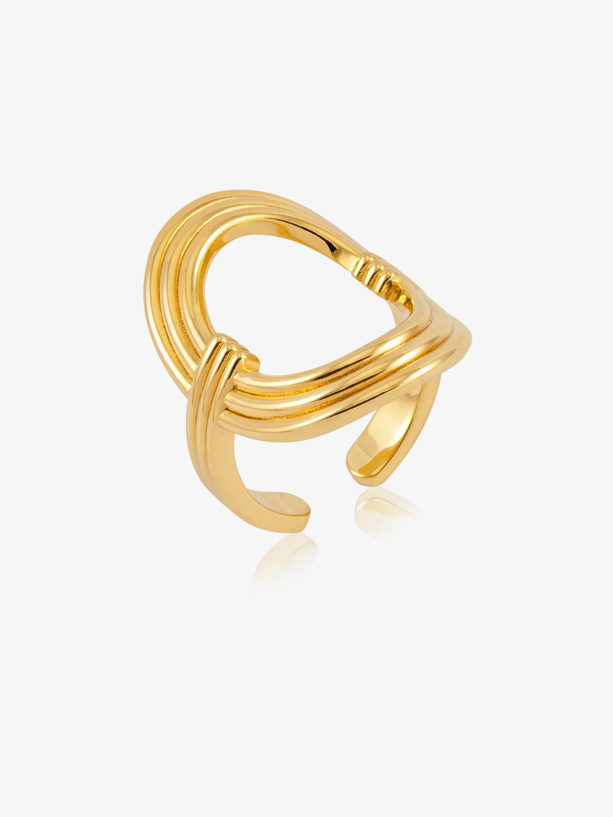 A polished gold-toned open ring ring with a multi-strand twisted design, shown on a light gray background with a soft reflection.