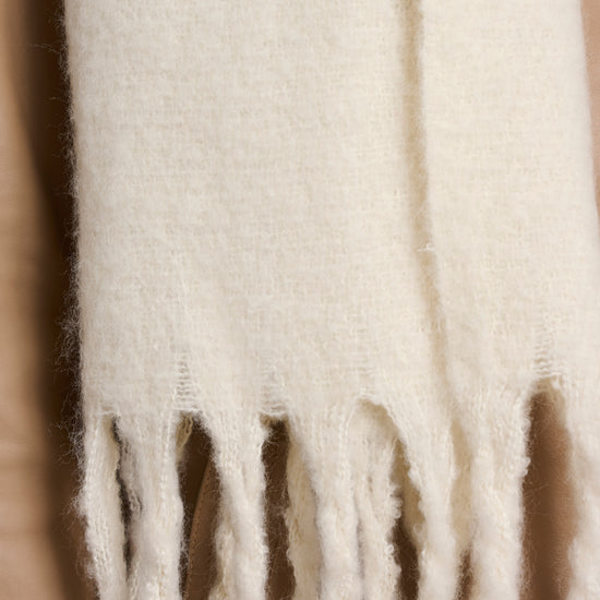 birch coloured big scarf with tassel ends close up