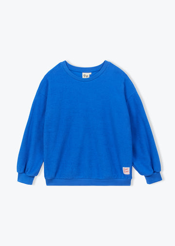 A bright blue crewneck sweatshirt with long sleeves and ribbed cuffs, shown flat against a light gray background.