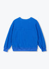 A bright blue long-sleeve crewneck sweatshirt shown from the back, laid flat against a light gray background.