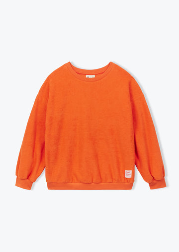 An orange crewneck sweatshirt with long sleeves and ribbed cuffs, shown flat against a light gray background.