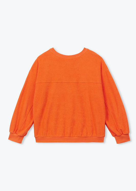 An orange long-sleeve crewneck sweatshirt shown from the back, laid flat against a light gray background.