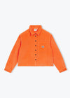 An orange corduroy button-up shirt jacket with a chest pocket and a small embroidered logo patch, displayed flat against a light gray background.