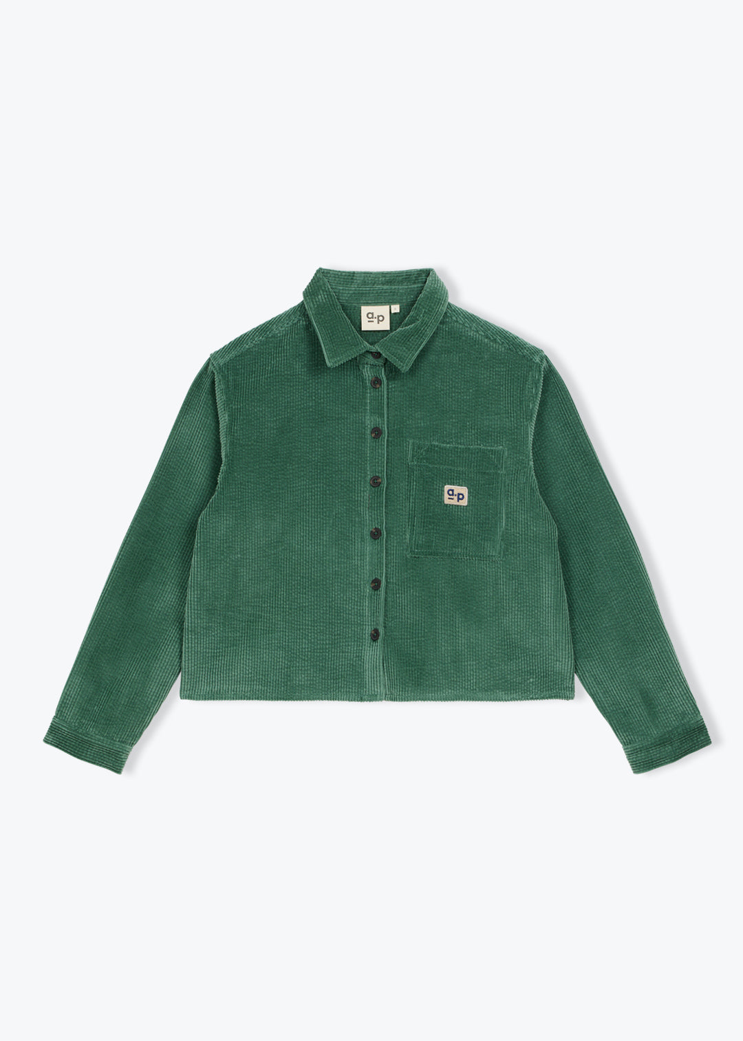 A green corduroy button-up shirt jacket with a chest pocket and a small square logo patch, displayed flat against a light gray background.
