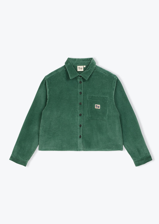 A green corduroy button-up shirt jacket with a chest pocket and a small square logo patch, displayed flat against a light gray background.