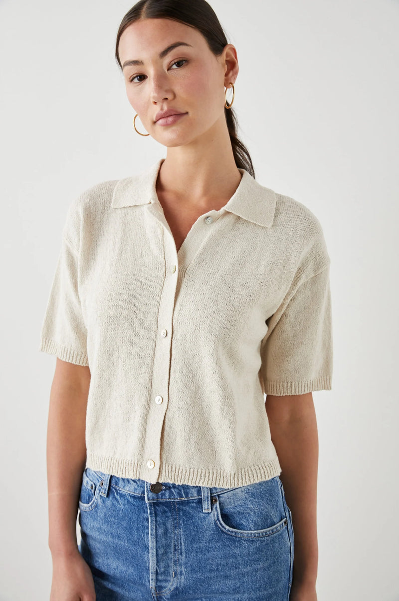 Ecru knitted top with short sleeves and button through with classic collar