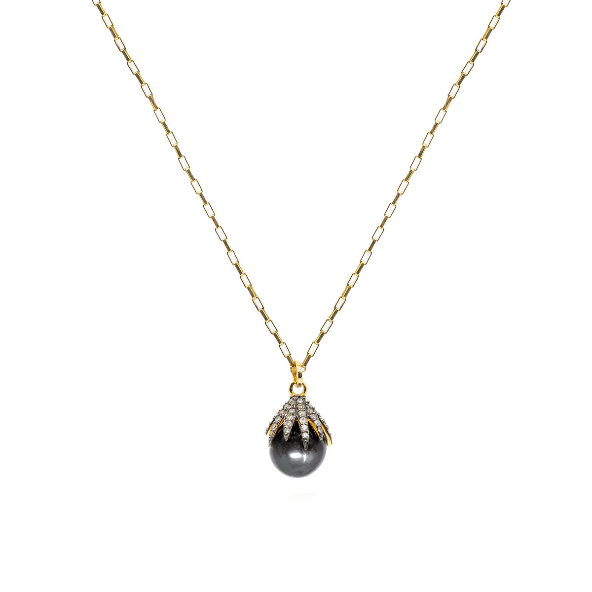 Hematite grey drop necklace held by a pave diamond claw setting on a gold plated belcher chain