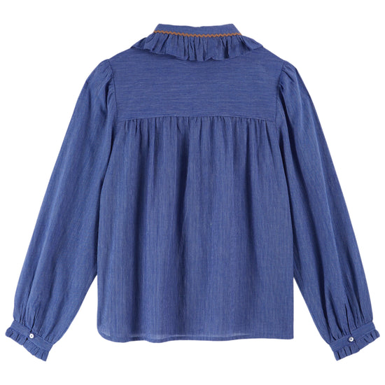 blue blouse with frill collar, chest pocket and elasticated cuffs with orange piping rear view