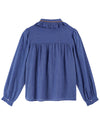 blue blouse with frill collar, chest pocket and elasticated cuffs with orange piping rear view