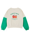 cream boxy cotton sweater with green arms and central park drawing on the back rear view