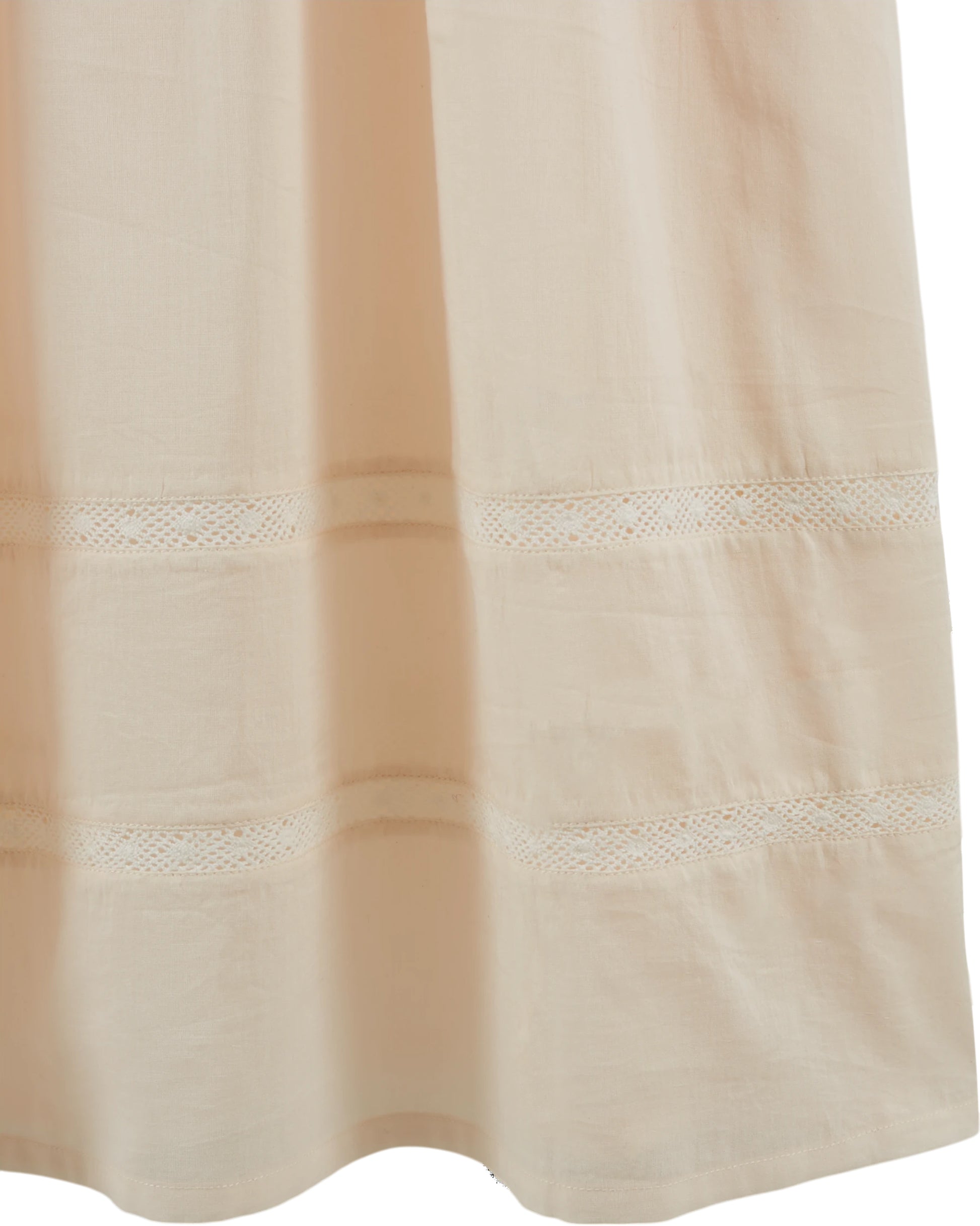 cream round neck short sleeve midi dress with buttoned half placket from emile and ida  close up of hem