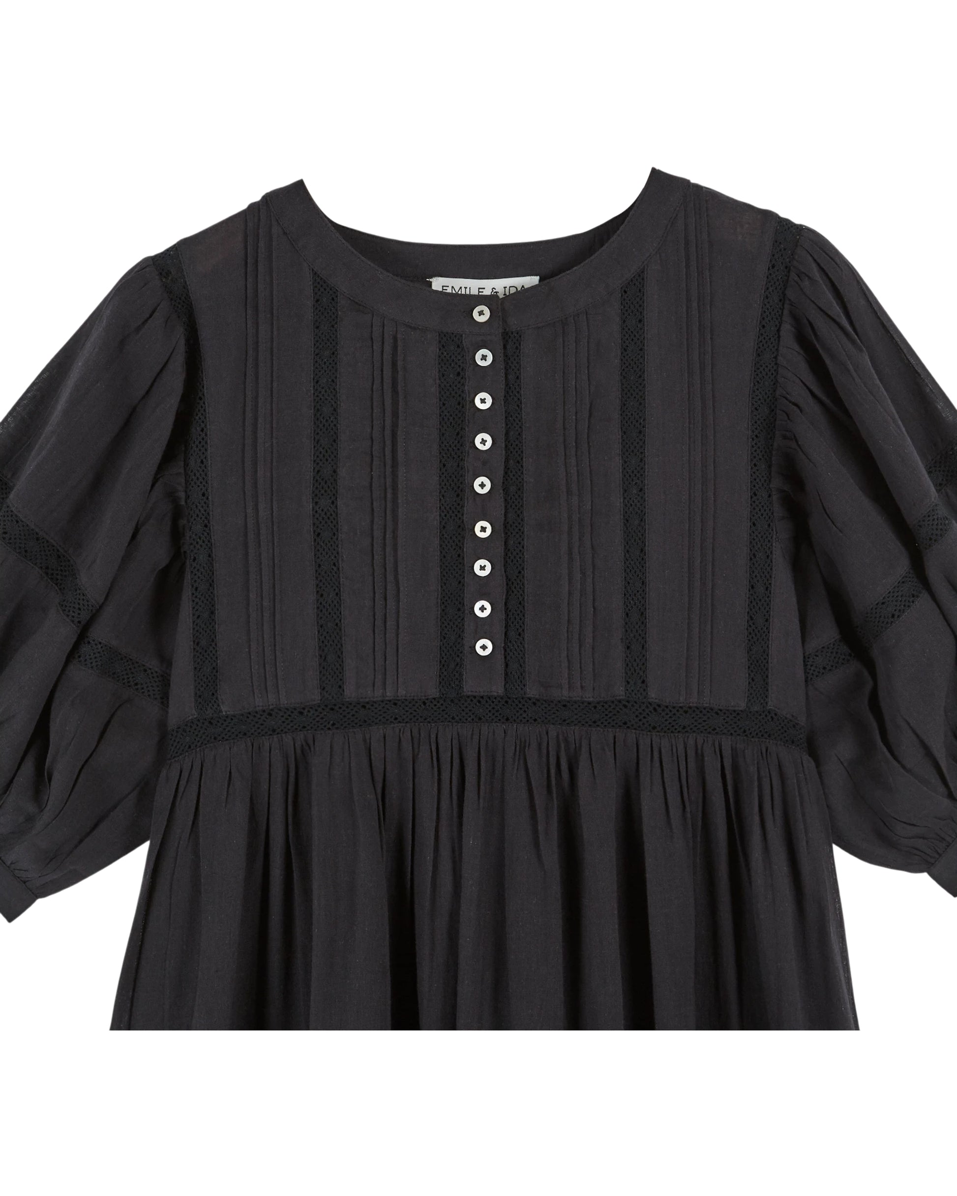 short sleeve mid length black dress with half placket button down from emile and ida  close up
